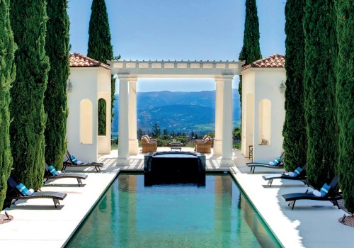 The Harmony Of Nature And Design: Pool Resurfacing For Timber Frame Homes In Pleasanton, CA